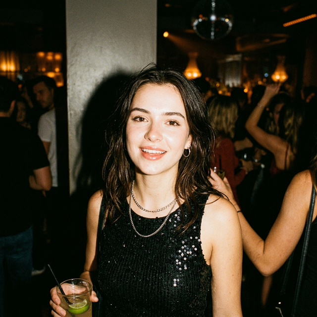 Portrait with beautiful warm flash light at a nightlife venue